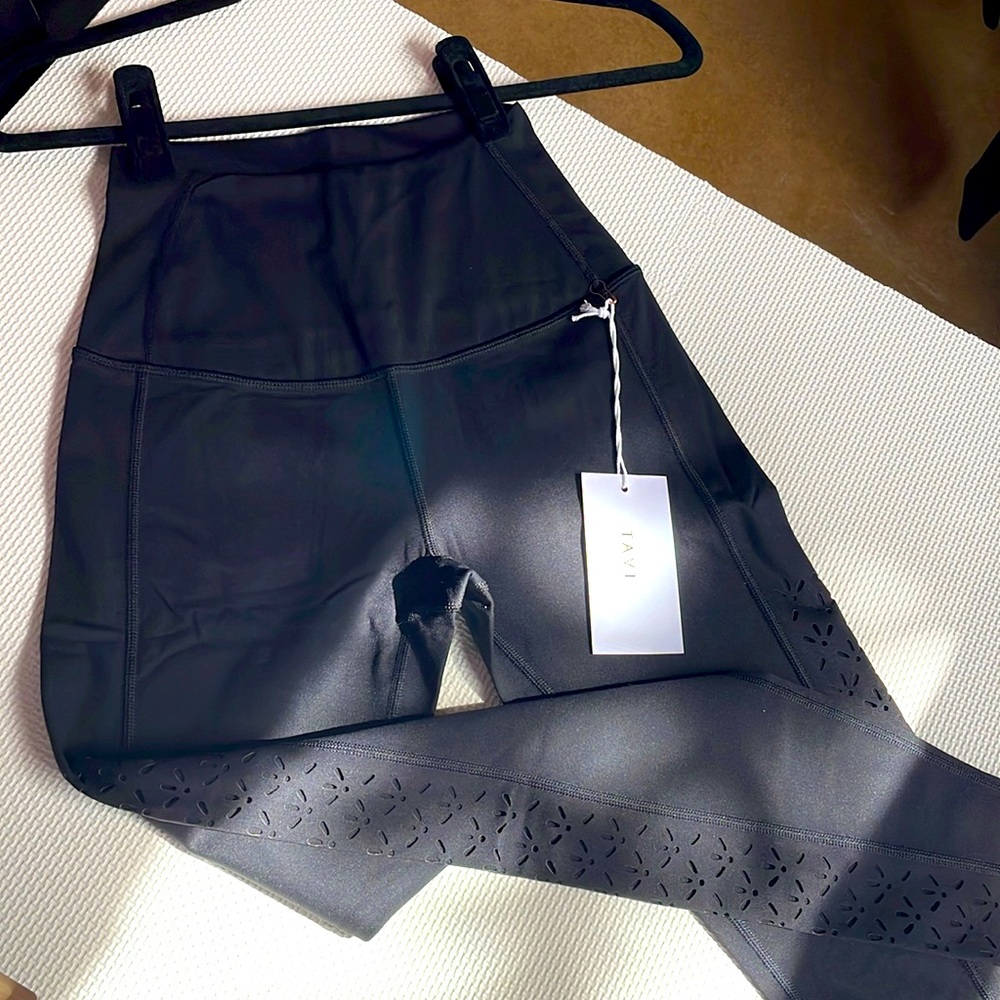 Awesome eyelet side accent with mesh from mid thigh down. 7/8 length.
